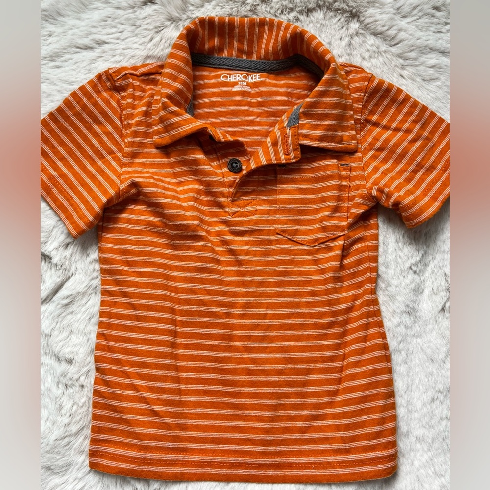Cherokee. 18 months. Orange polo.